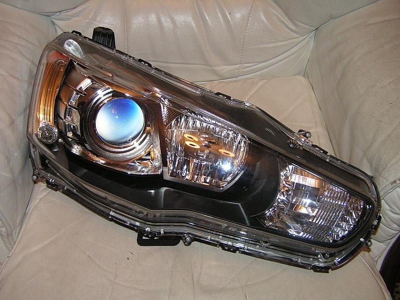 Форсунка омивача фари передньої, лівою Tqparts TQ21080 ціна, від 30.38 USD