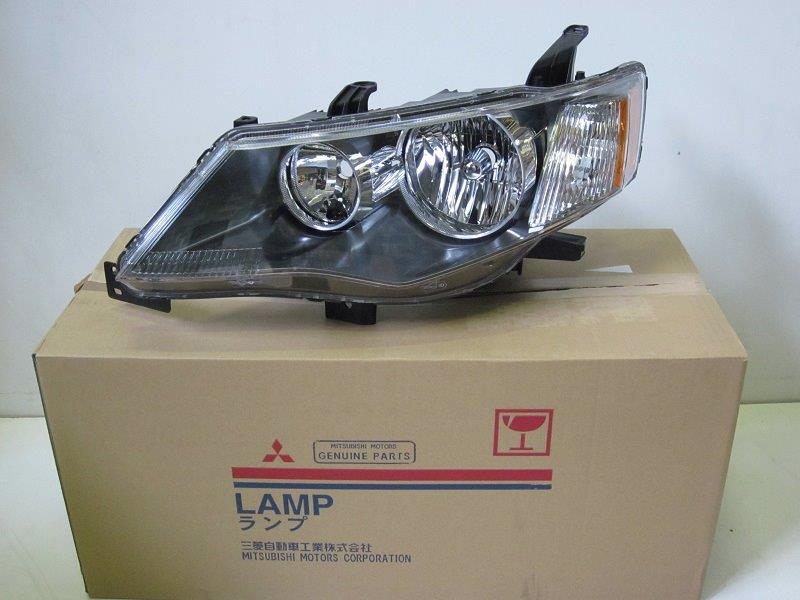 Основна фара в зборі ліва на Mitsubishi Outlander II XL CWW