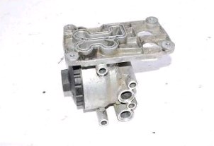 Радіатор масляний (холодильник), під фільтром Ford 1143708 ціна, від 34.99 USD