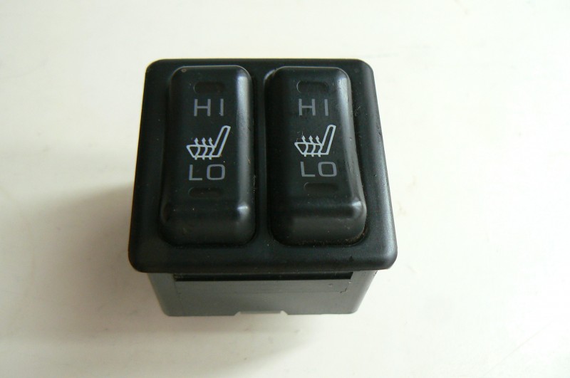 Кнопка вкл.обогрева сидіння на Mitsubishi Lancer (CY_A, CZ_A)