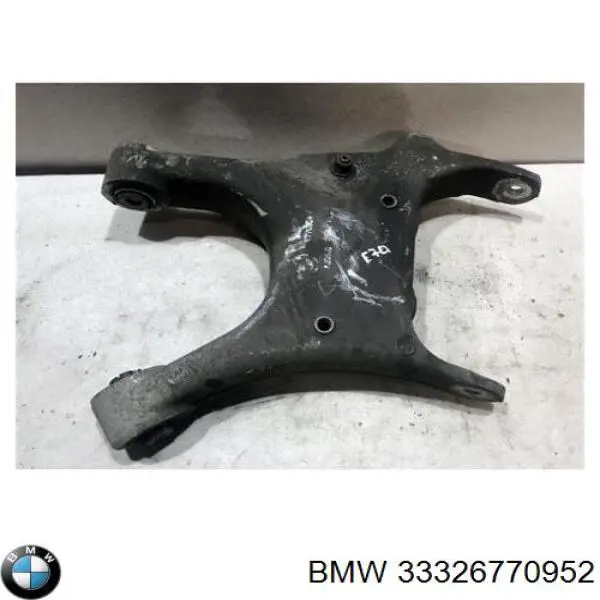 Купити 677095407 BMW Важіль задньої підвіски нижній, правий