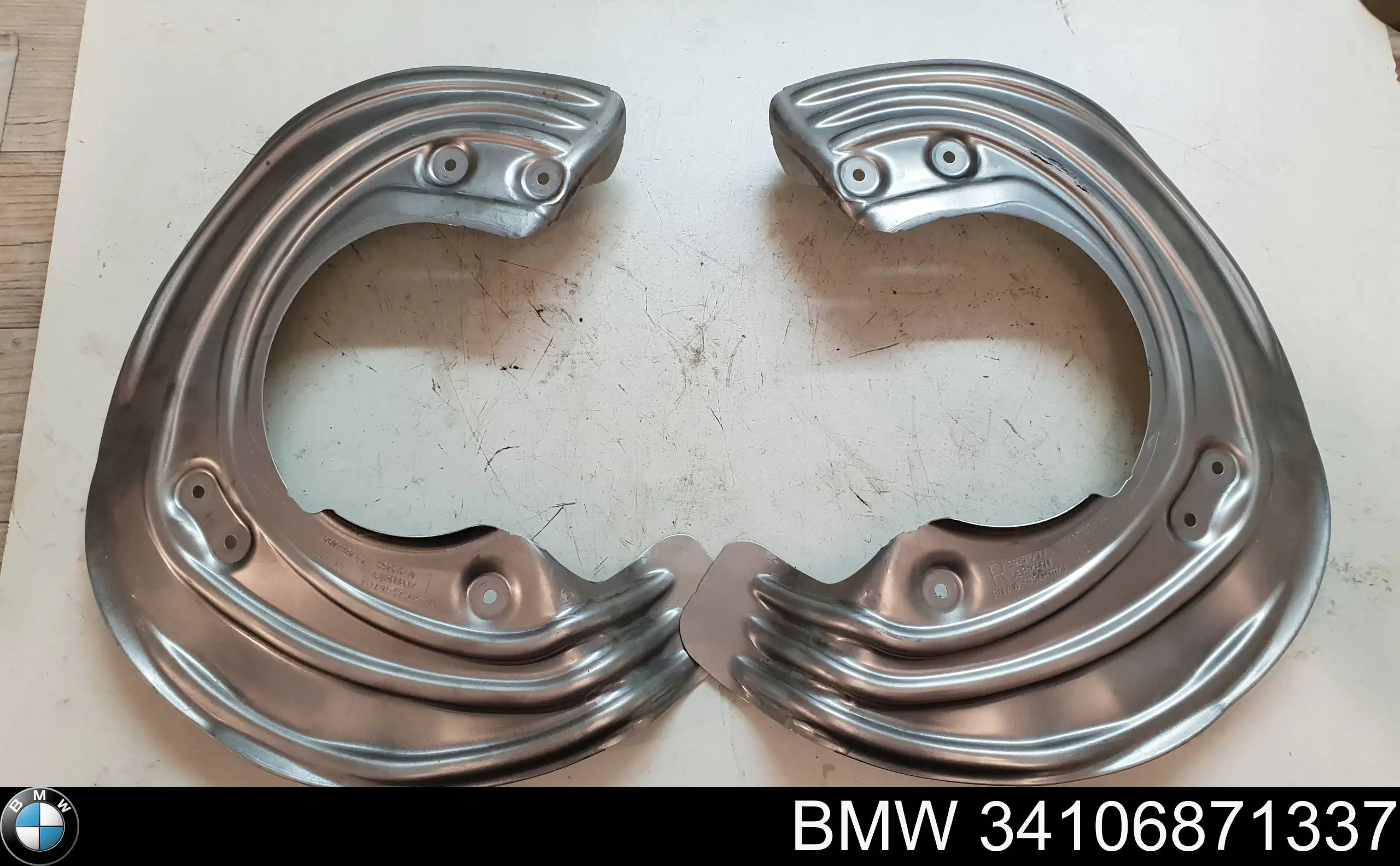 Захист гальмівного диска, переднього, лівого BMW 34106871337 ціна, від 15.20 USD