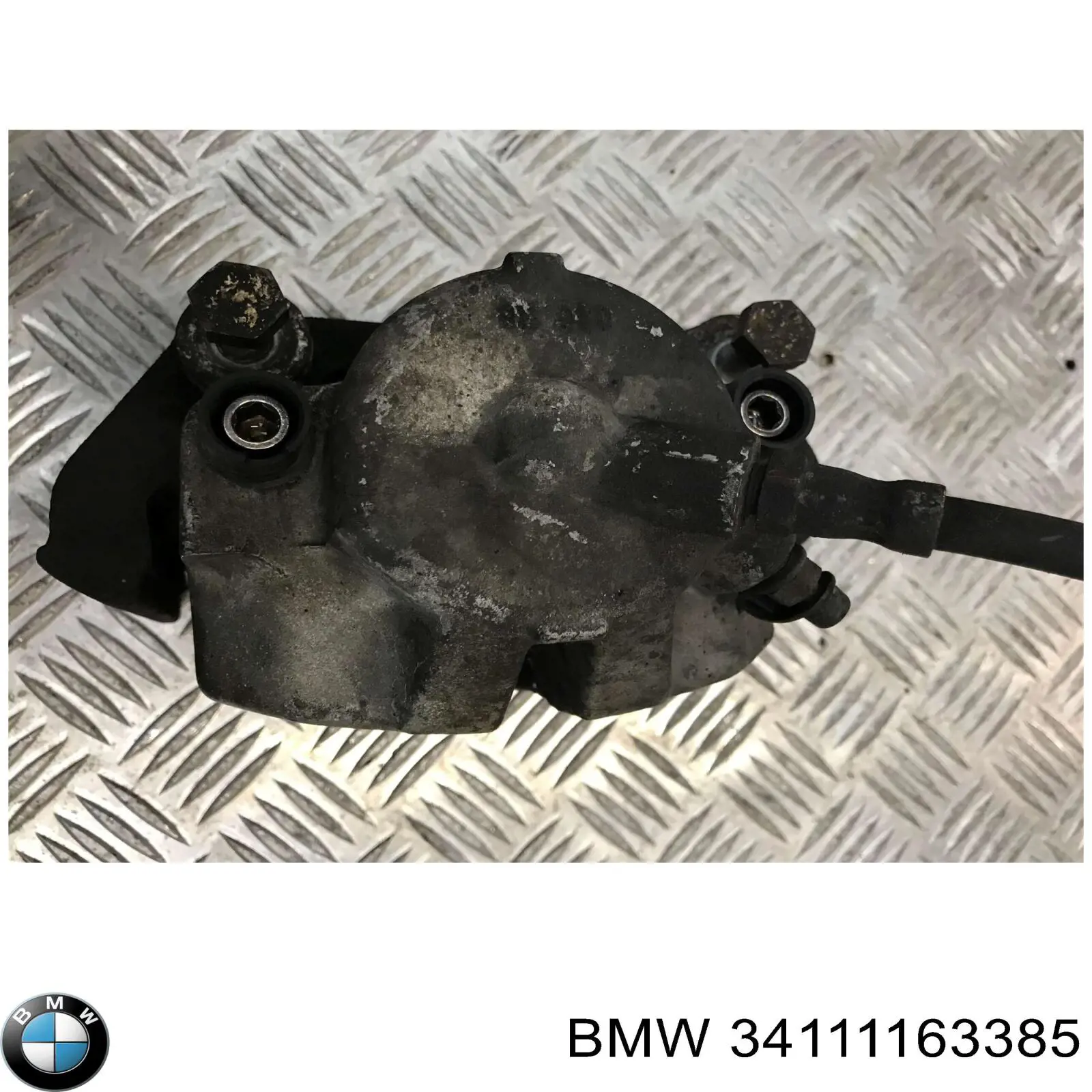 34111163385 BMW Супорт гальмівний, передній, лівий