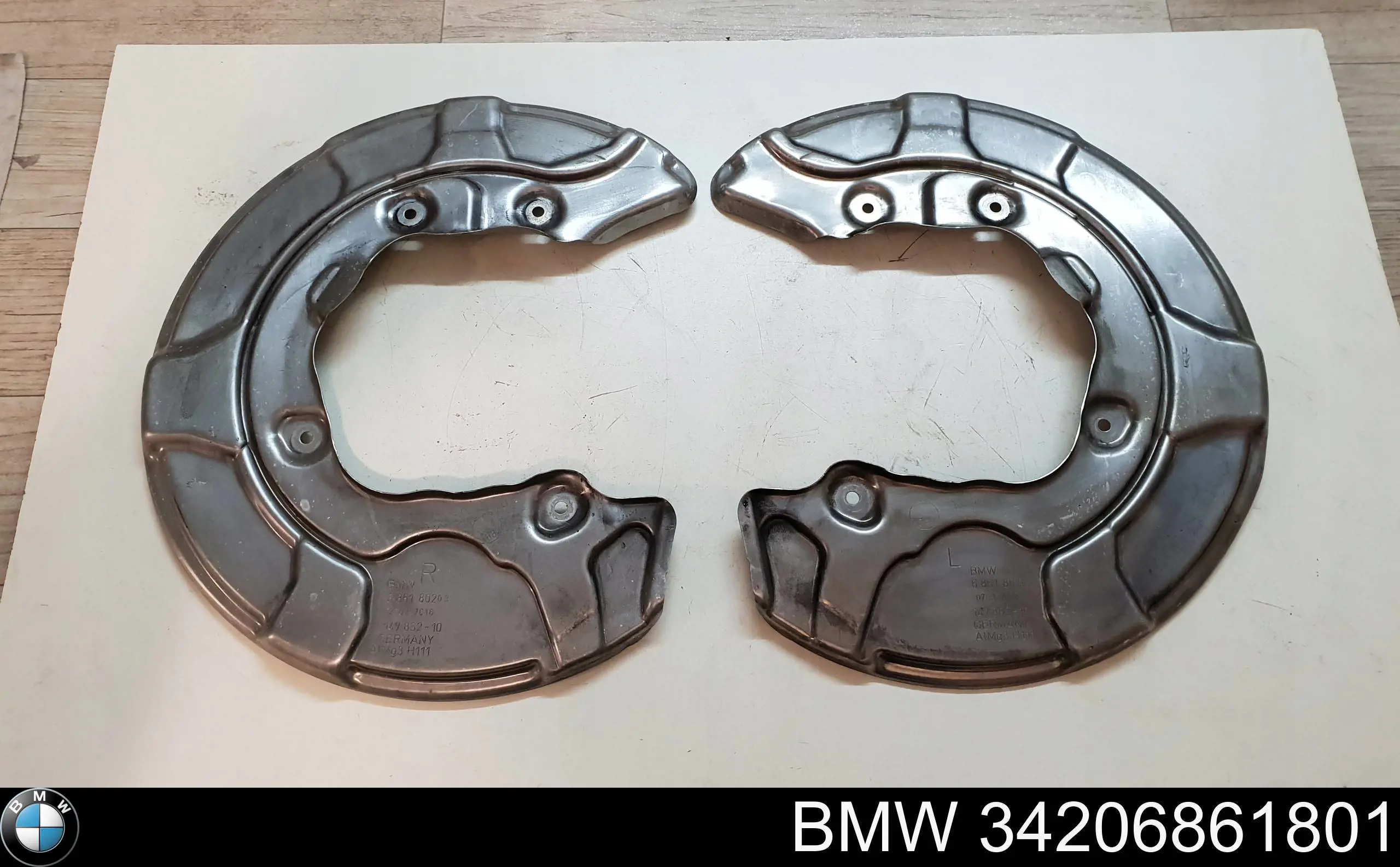 Захист гальмівного диска заднього, лівого BMW 6861801 ціна, від 16.51 USD