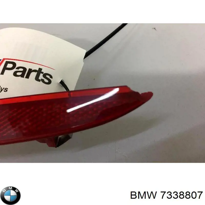 Катафот (відбивач) заднього бампера, лівий 7338807 BMW