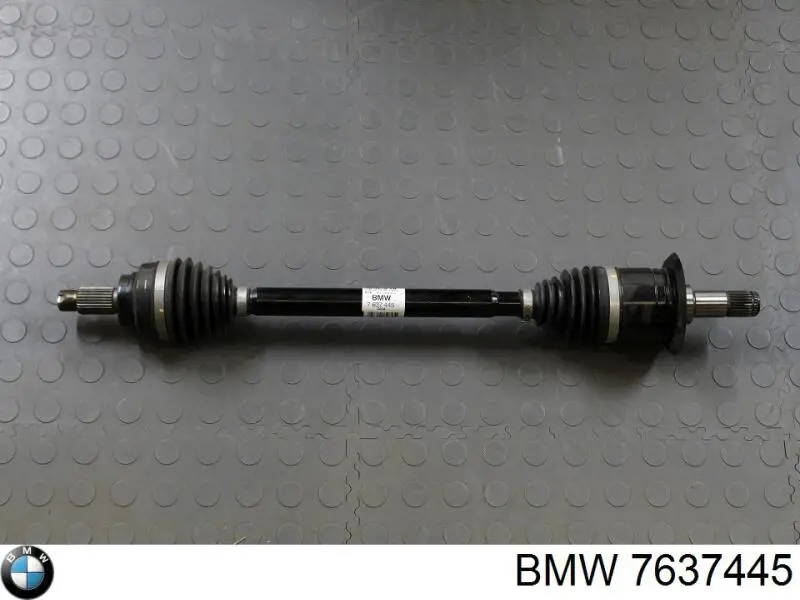 7637445 BMW Піввісь задня, ліва
