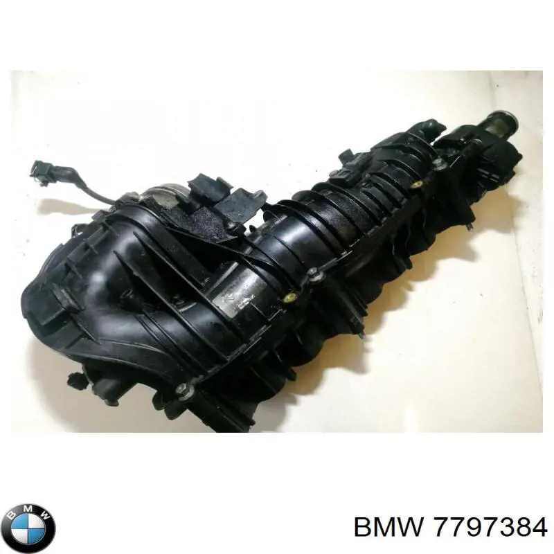 7797384 BMW Колектор впускний