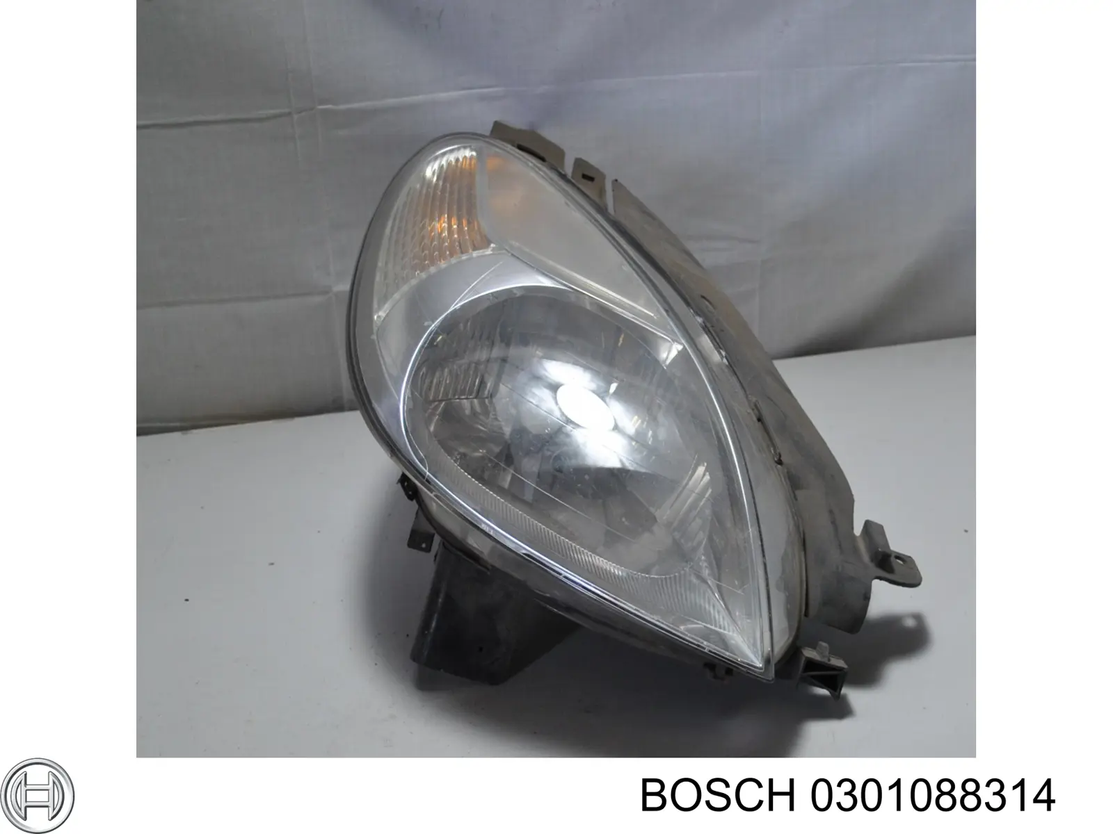 Основна фара - вставка Bosch 0301088314 ціна, від 39.37 USD