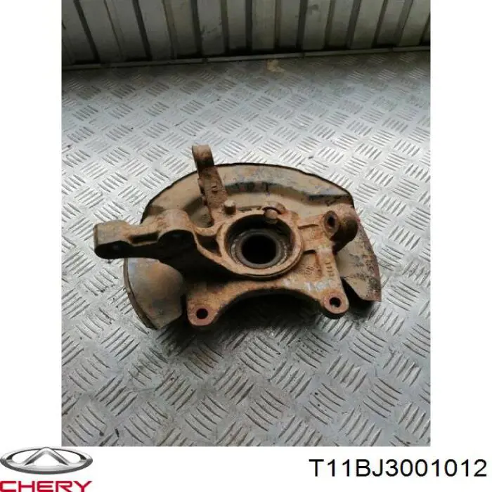T11BJ3001012 Chery Цапфа поворотна права