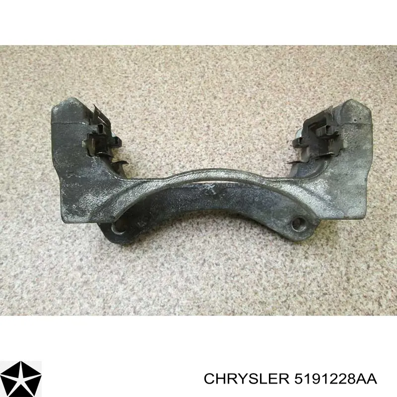 05191228AA Chrysler Скоба гальмівного супорта переднього