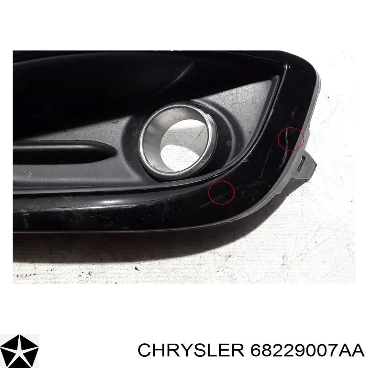 Заглушка/ решітка протитуманних фар бампера переднього, ліва 68229007AA Chrysler