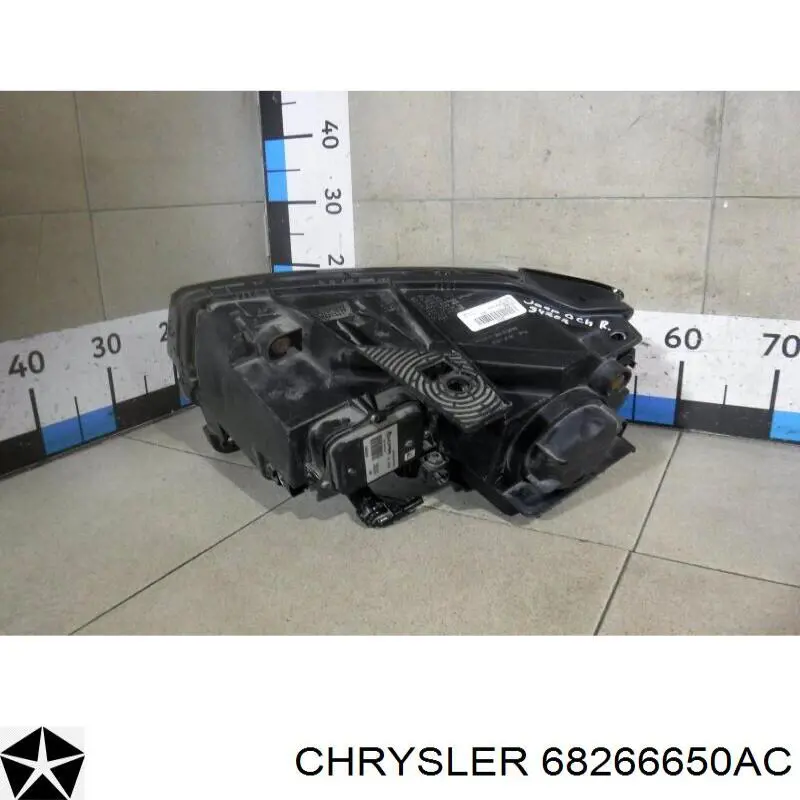Основна фара - вставка Chrysler 68266650AC ціна, від 283.45 USD