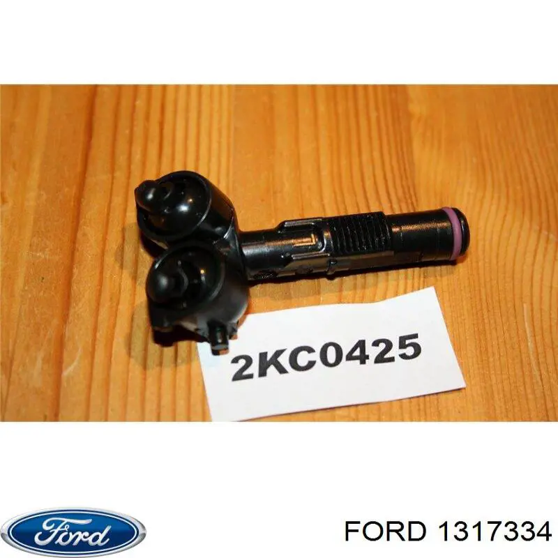 Форсунка омивача фари передньої, лівою Ford 1317334 ціна, від 21.11 USD