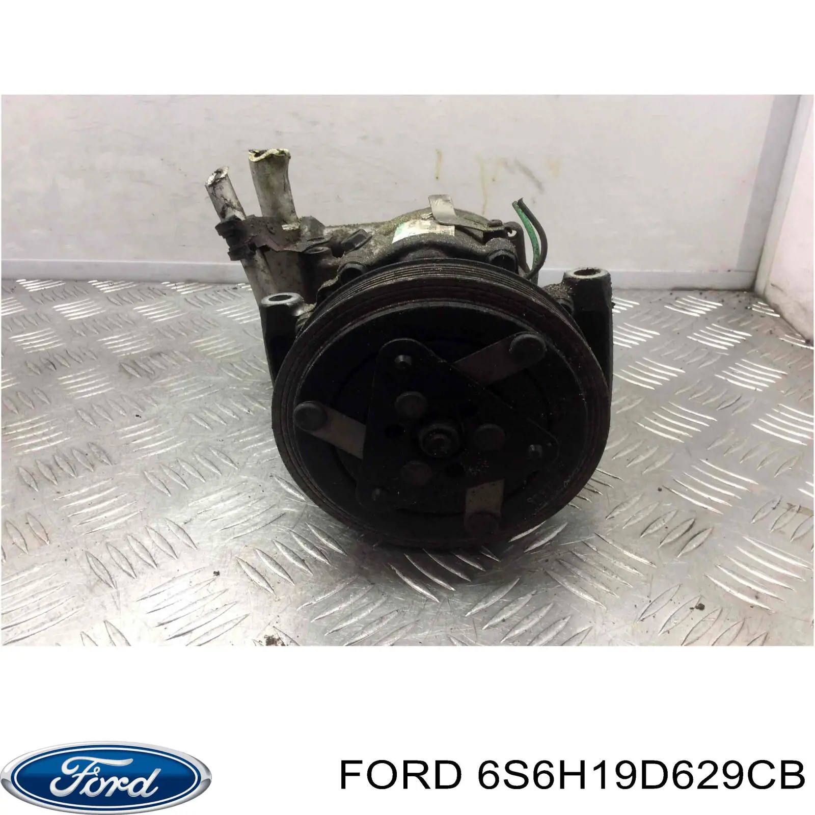 Компресор кондиціонера 6S6H19D629CB Ford