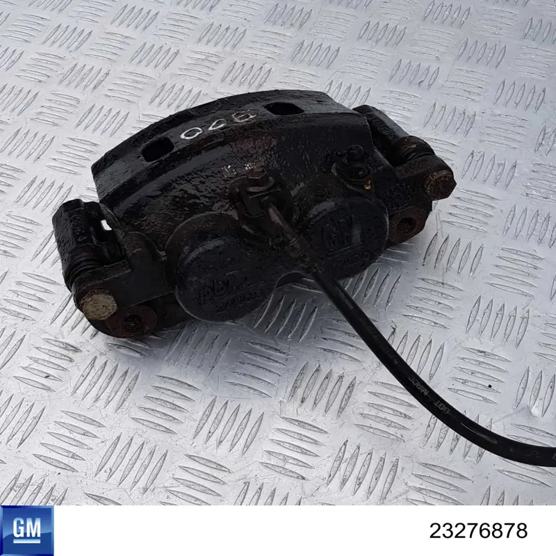 Супорт гальмівний передній лівий 85569601 General Motors