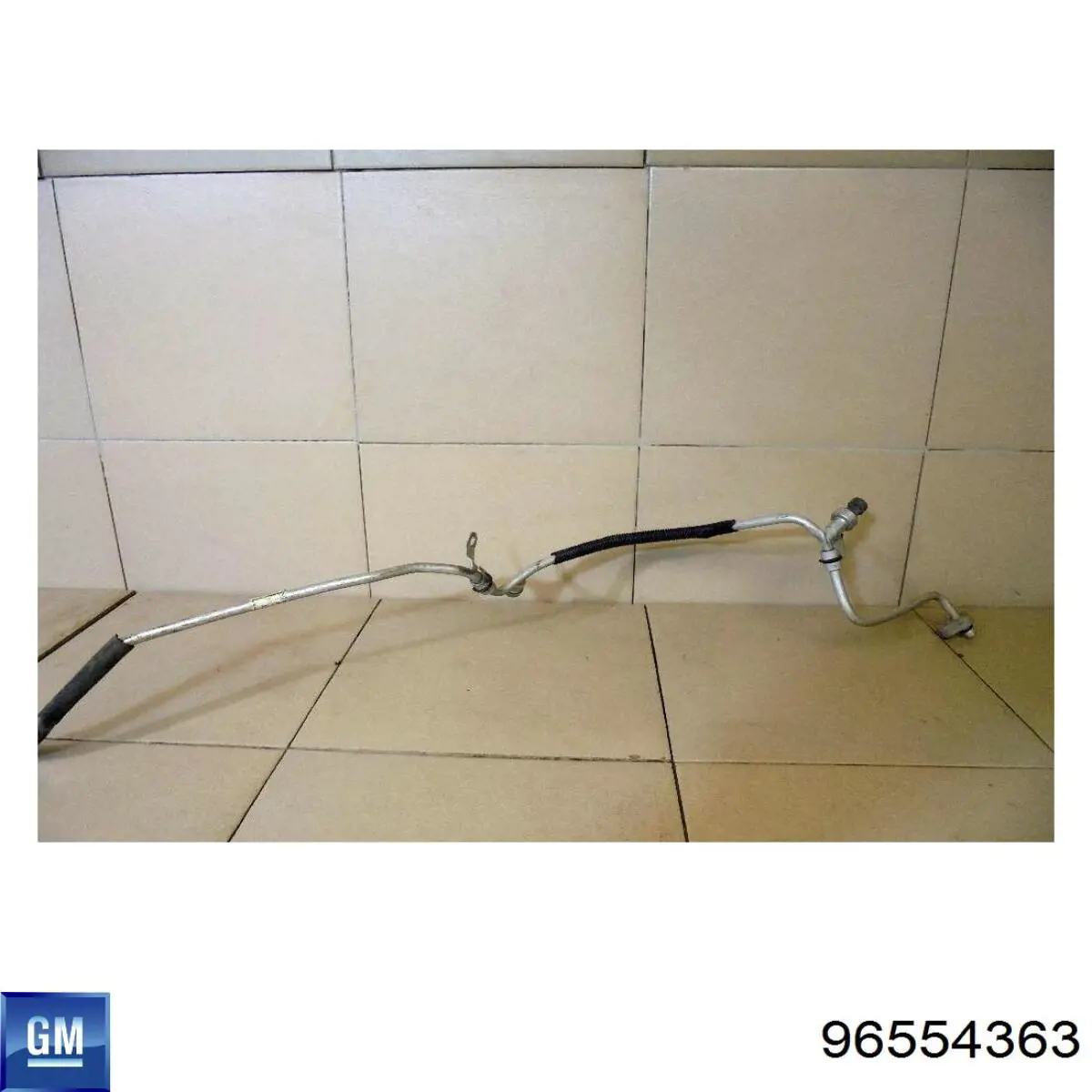 Купити 96554363 General Motors Шланг кондиціонера, від радіатора до випарника