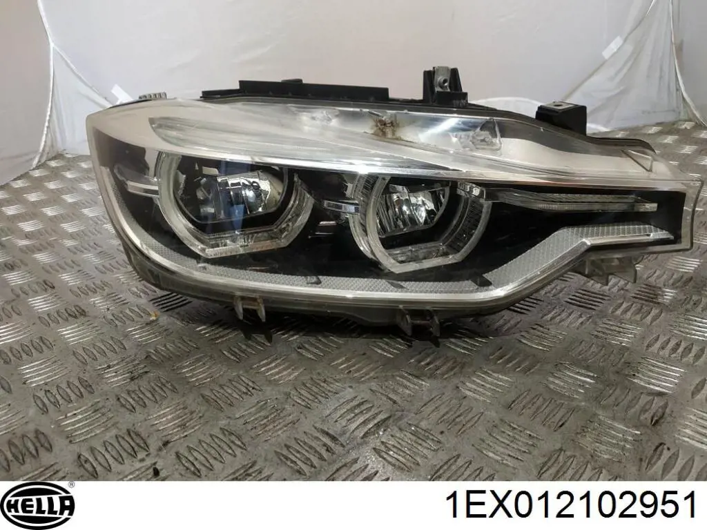 Купити 1EX012102951 HELLA Фара ліва передня