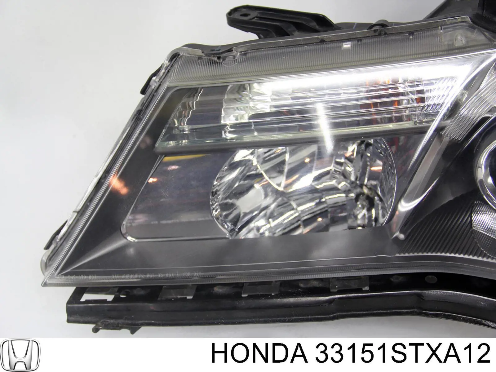 Фара ліва передня Honda 33151STXA12 ціна, від 152.02 USD