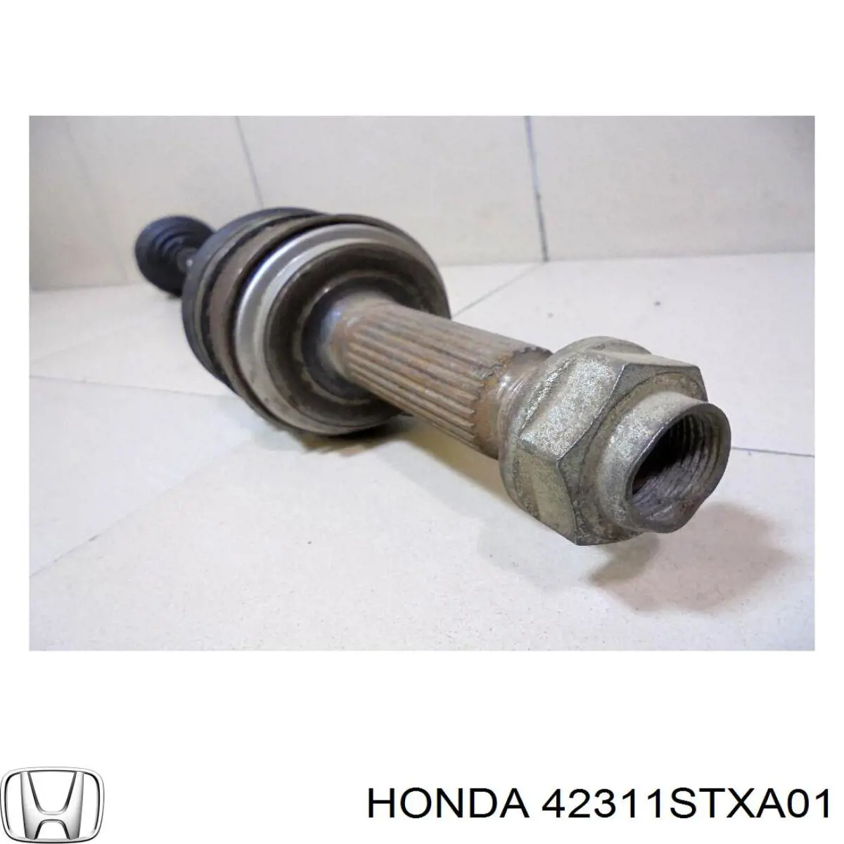 Піввісь задня, ліва 42311STXA01 Honda