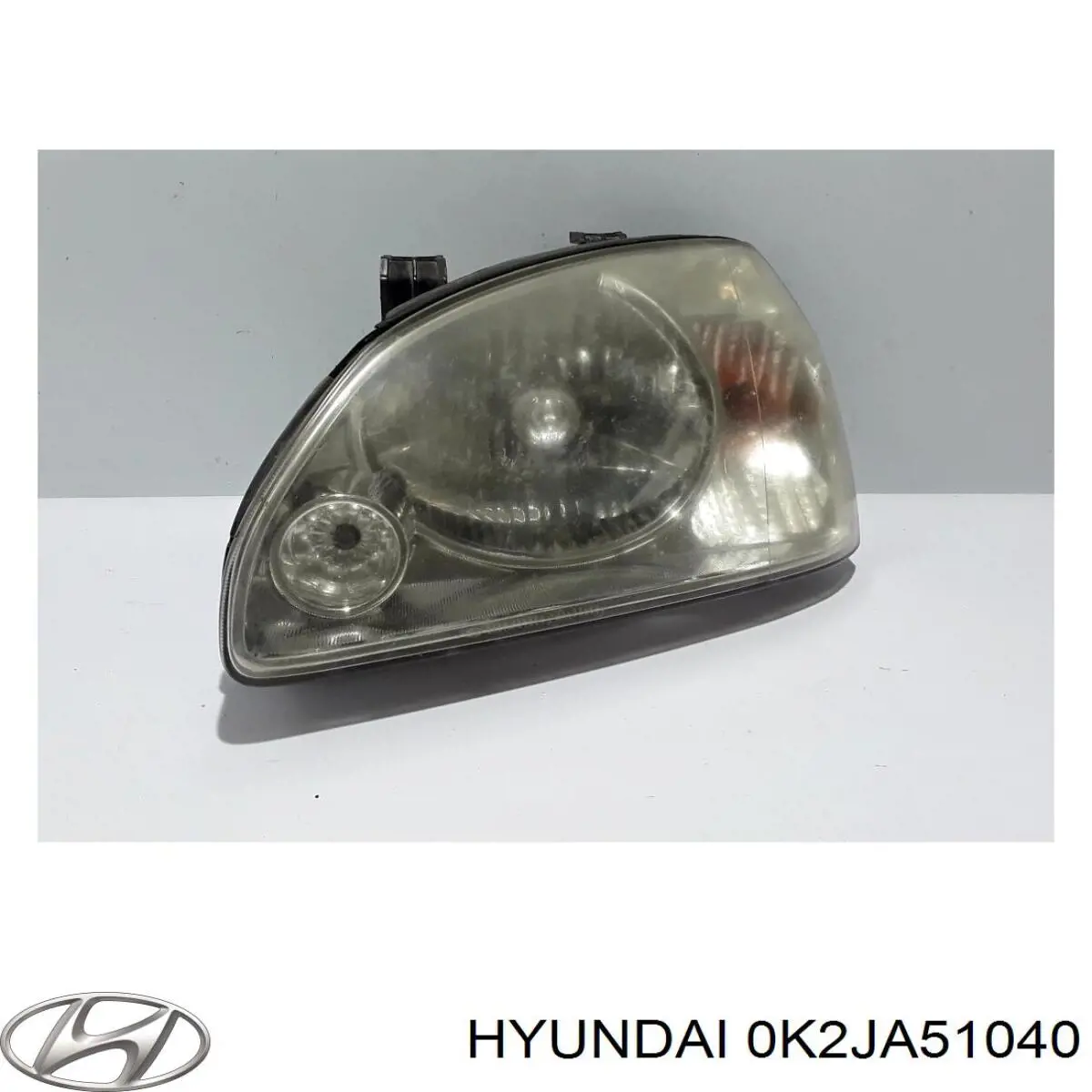 Купити 0K2FA51020L Hyundai/Kia Основна фара в зборі ліва