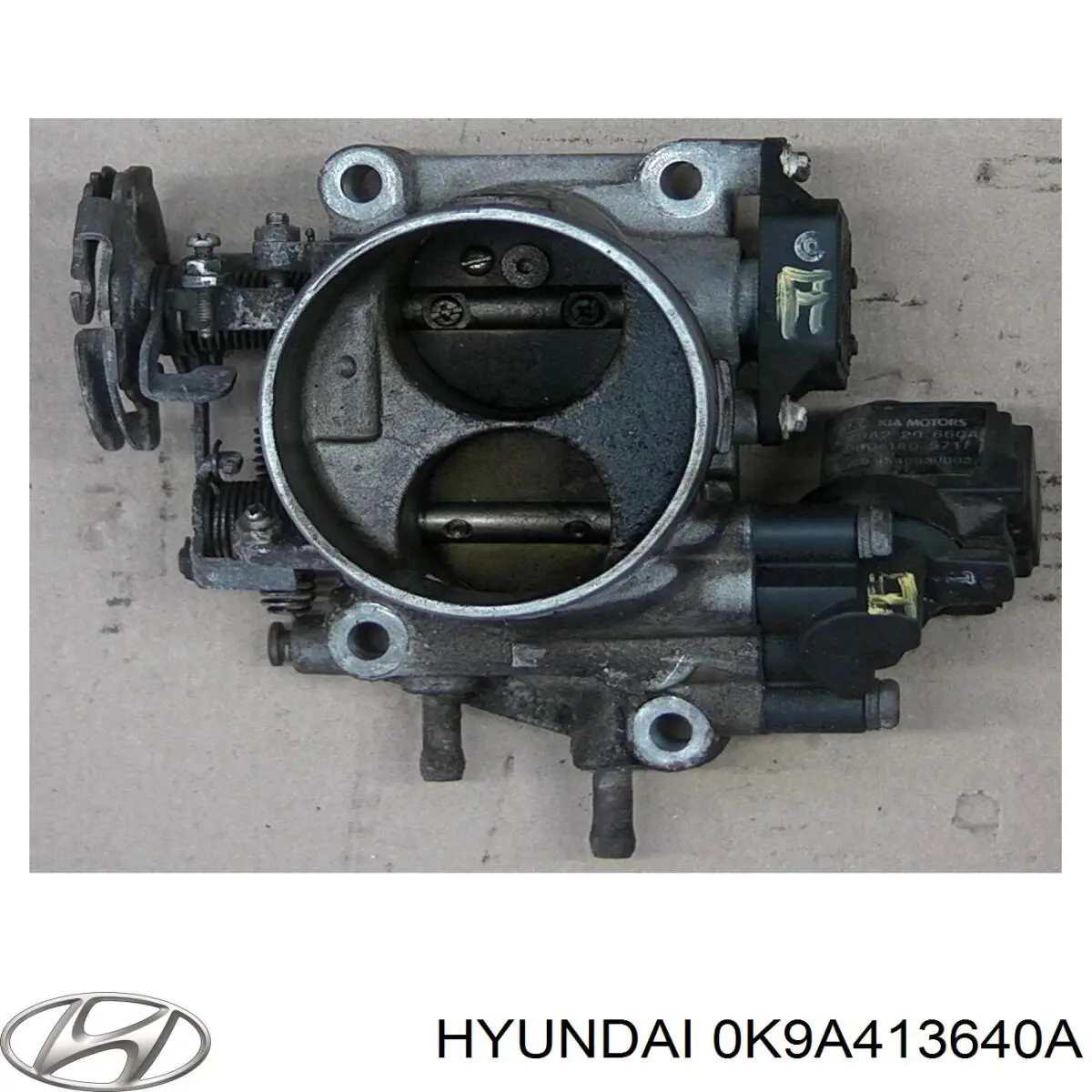 Дросільна заслінка в зборі 0K9A413640A Hyundai/Kia