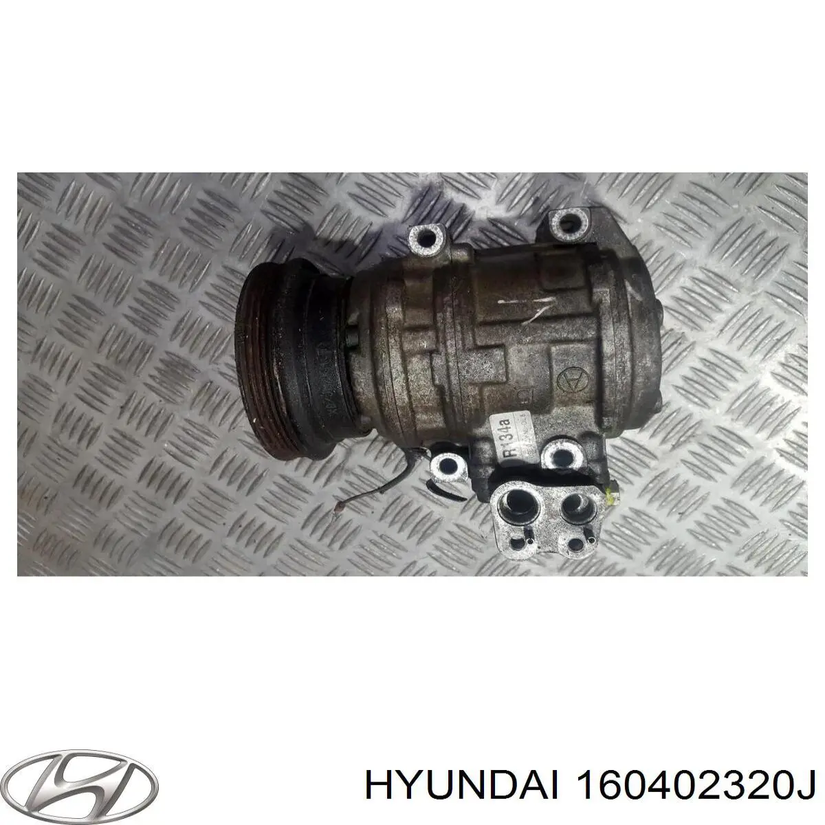 Компресор кондиціонера 160402320J Hyundai/Kia