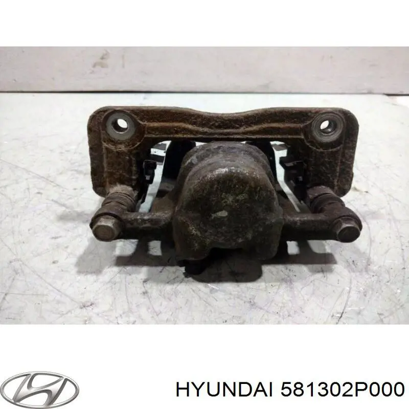 581302P000 Hyundai/Kia Супорт гальмівний передній правий