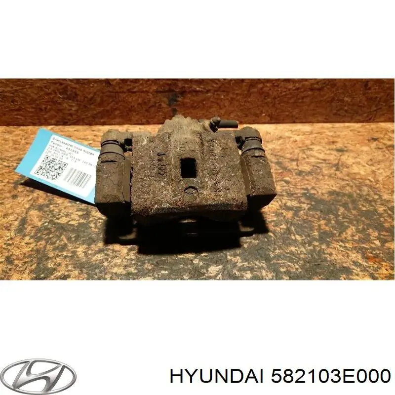 Супорт задній лівий 582103E000 Hyundai/Kia