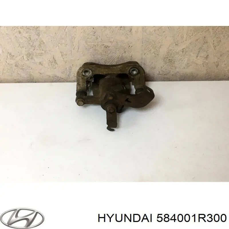 584001R300 Hyundai/Kia Супорт гальмівний задній правий