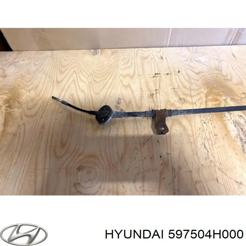 597504H000 Hyundai/Kia Трос ручного гальма передній