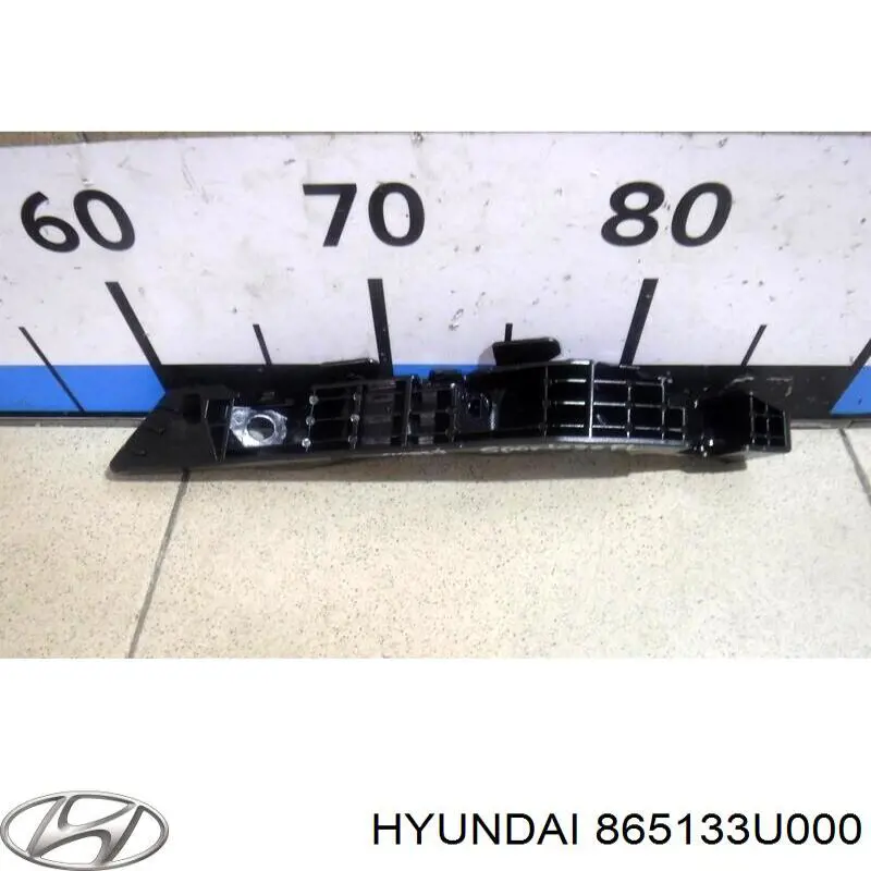 865133U000 Hyundai/Kia кронштейн бампера переднього, лівий