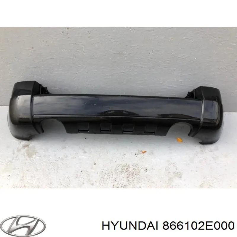 Задній бампер 866102E000 Hyundai/Kia