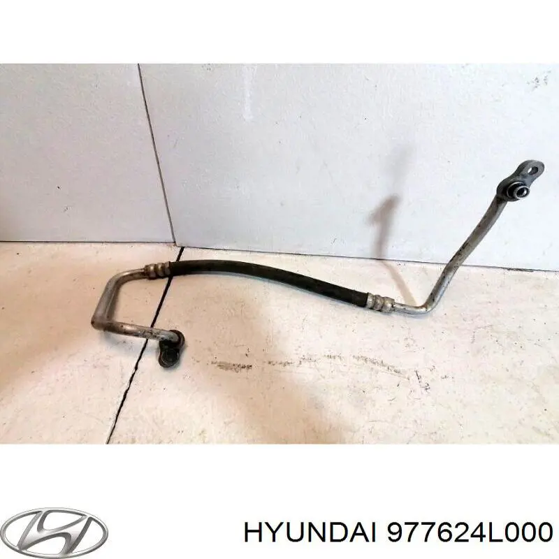 Купити 977624L000 Hyundai/Kia Шланг кондиціонера, від компресора до радіатора