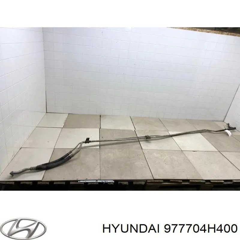 977704H400 Hyundai/Kia Шланг кондиціонера, від заднього випарювача до компресора