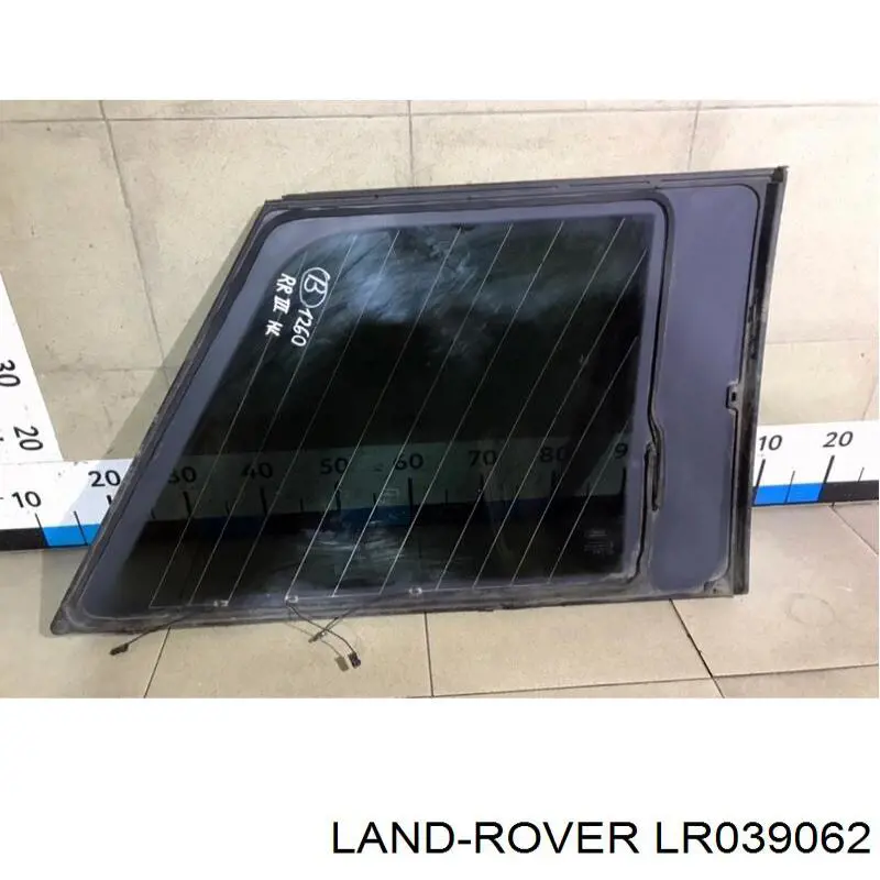 Купити LR017458 Land Rover Скло багажного відсіку, ліве