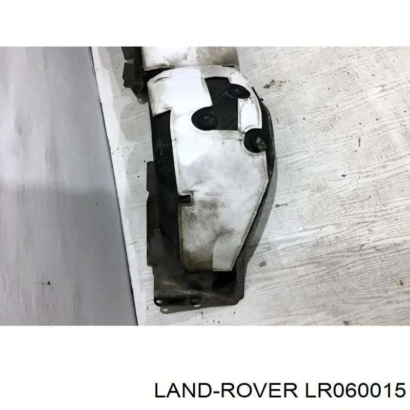 LR050800 Land Rover Підкрилок заднього крила, лівий