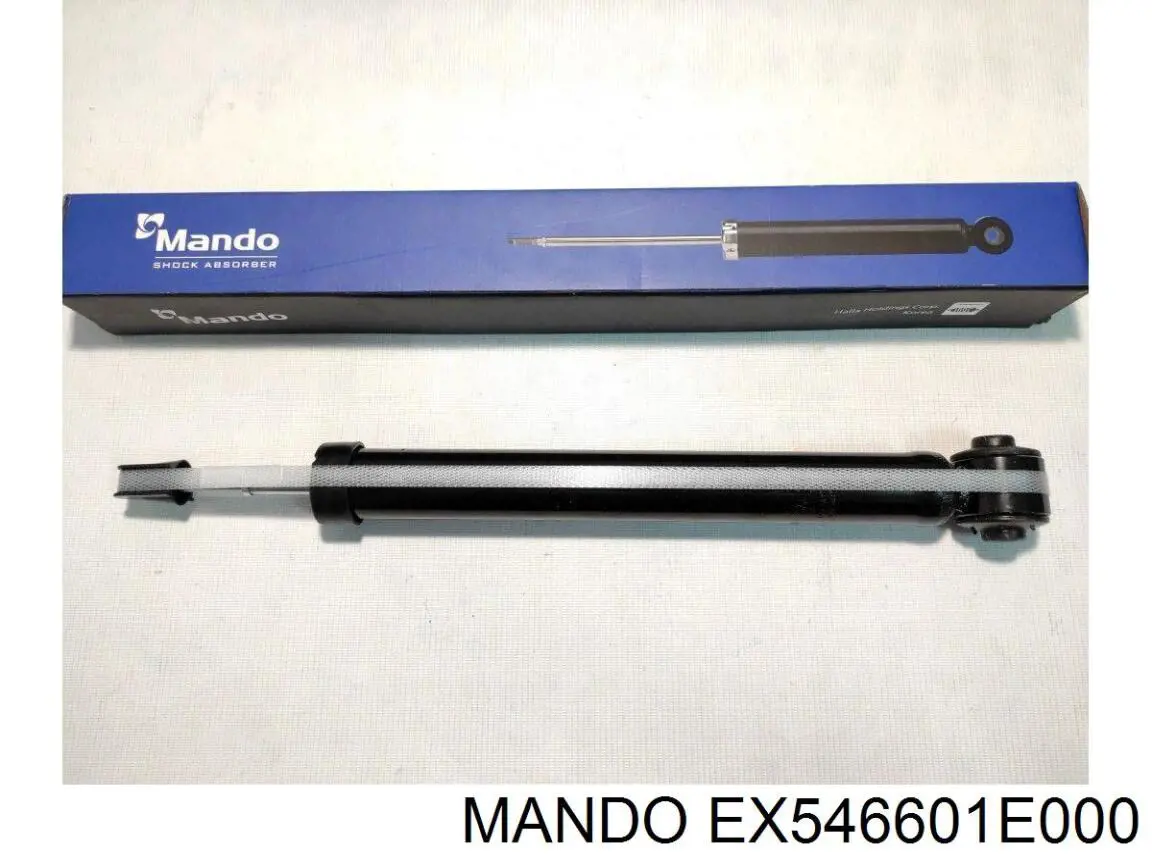 EX546601E000 Mando амортизатор передній, правий