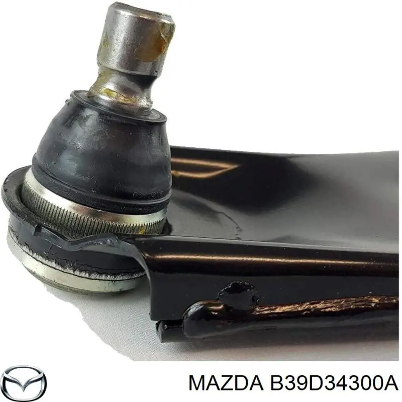 Правий важіль передній нижній підвіски Mazda B39D34300A
