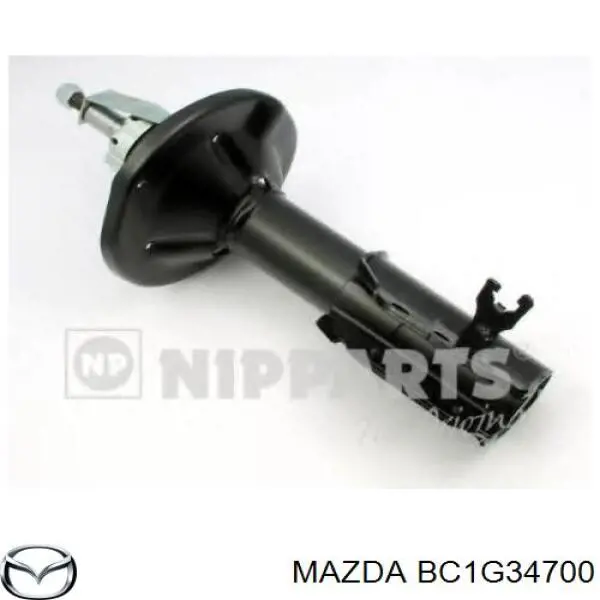 Амортизатор передній, правий BC1G34700 Mazda