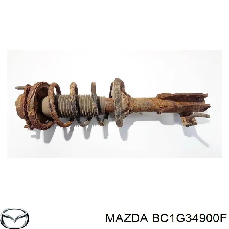 Купити BC1G34900F Mazda Амортизатора передній лівий