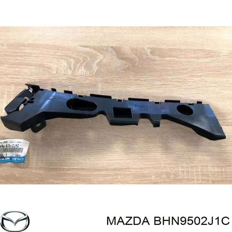 BHN9502J1C Mazda Кронштейн бампера заднього, зовнішній лівий