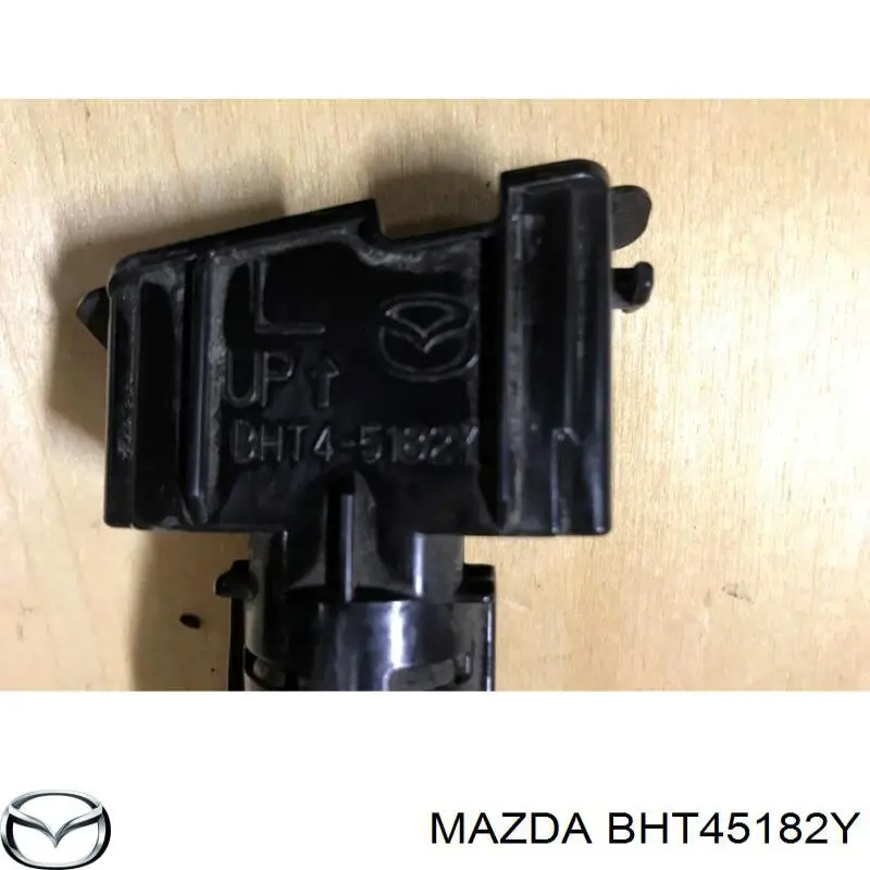 Форсунка омивача фари передньої, лівою Mazda 3 (BM, BN) (Мазда 3)
