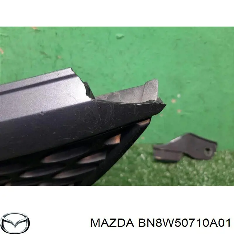 Решітка Mazda 3 