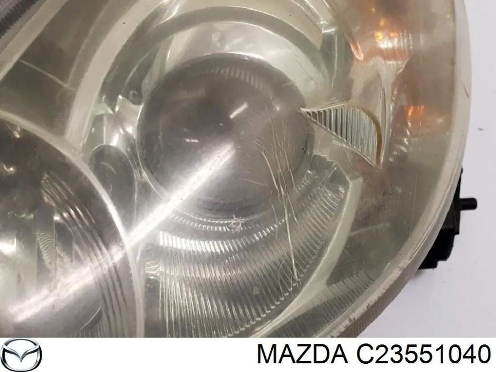 Купити C23551040 Mazda Основна фара в зборі ліва