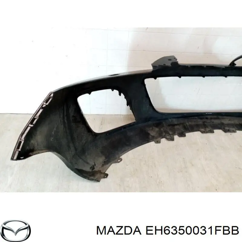 Бампер передній Mazda EH6350031FBB