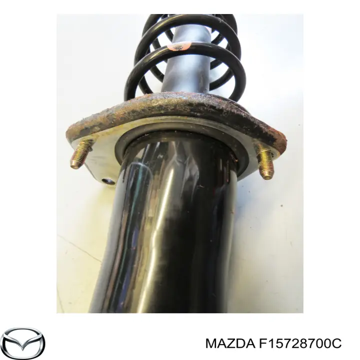F15728700C Mazda Амортизатори задні