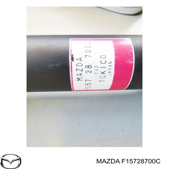 Купити F15728700C Mazda Стійка амортизатора задня