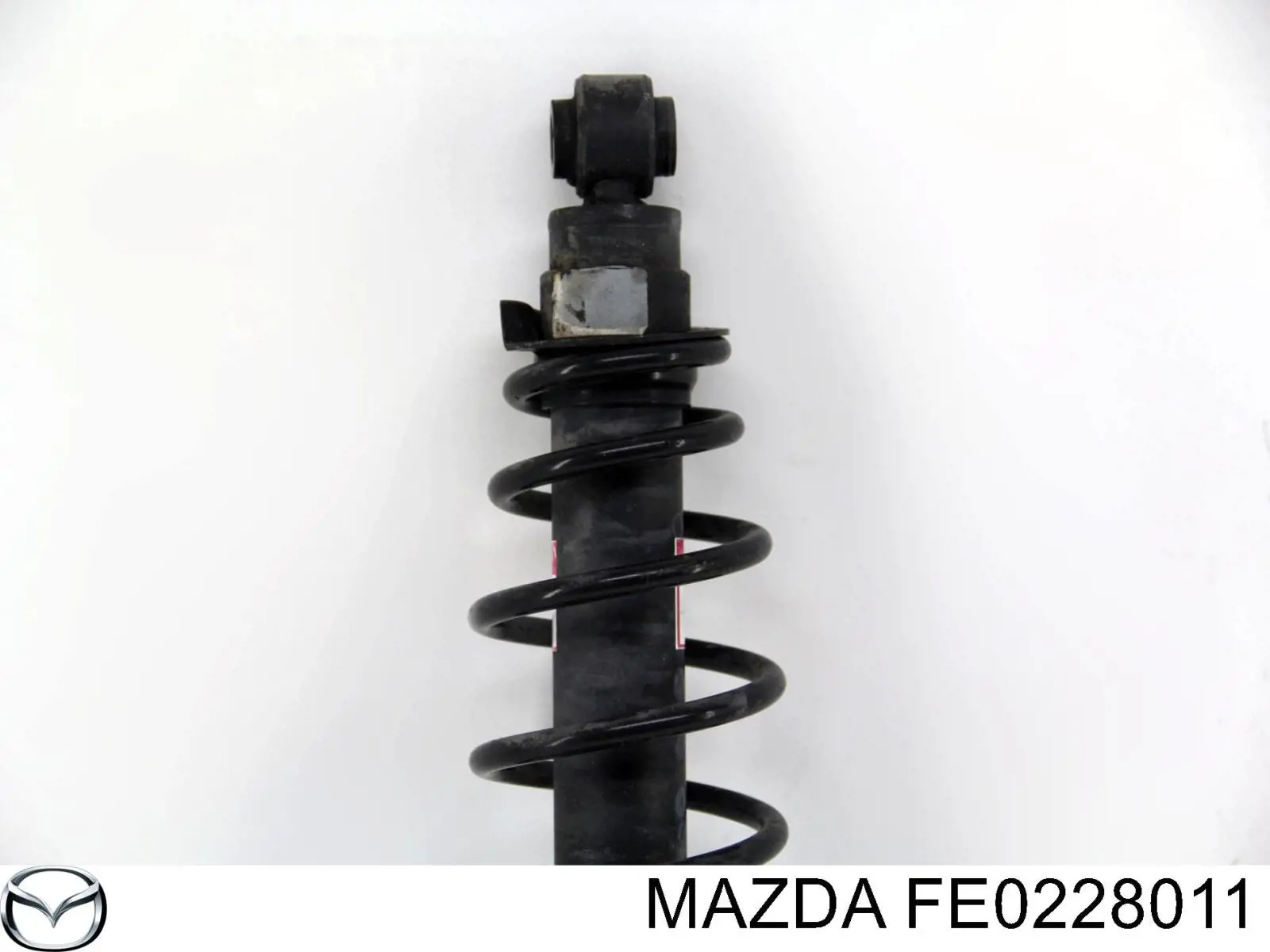 FE0228011 Mazda Пружина підвіски задня