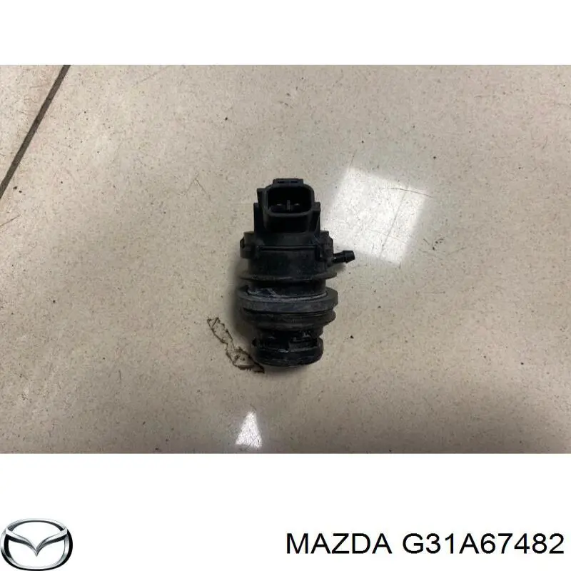G31A67482 Mazda насос-двигун омивача скла, заднього