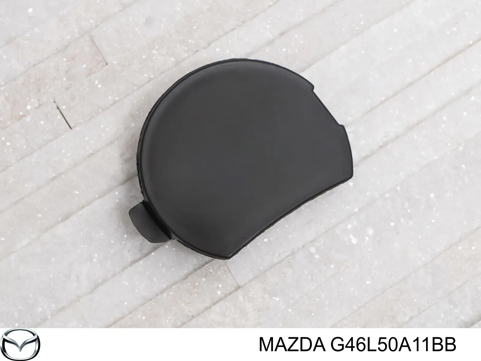 G46L50A11BB Mazda Заглушка бампера буксирувального гака, передня